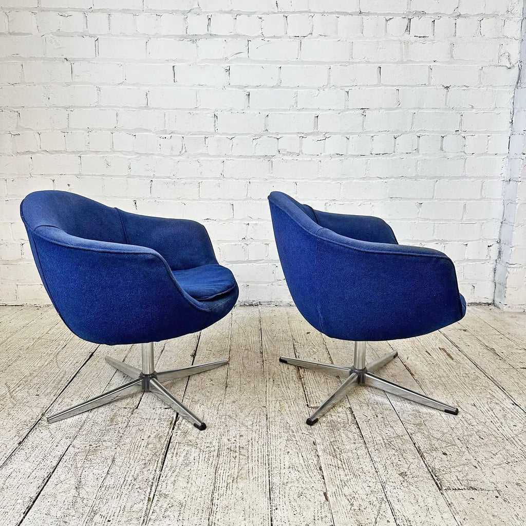 Pair of Overman Swivel Chairs